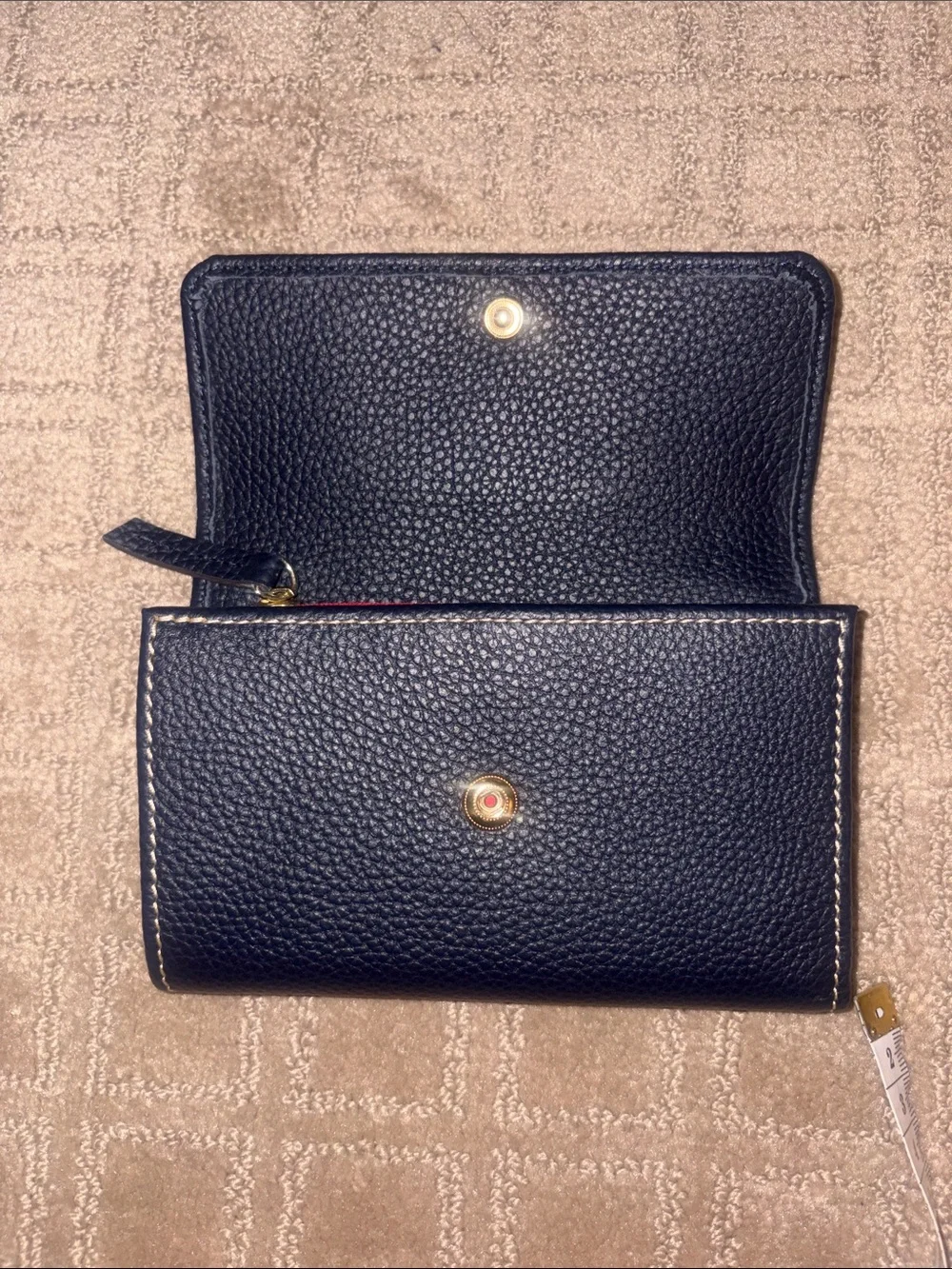 Dooney & Bourke Black Pebbled Leather Flap wallet